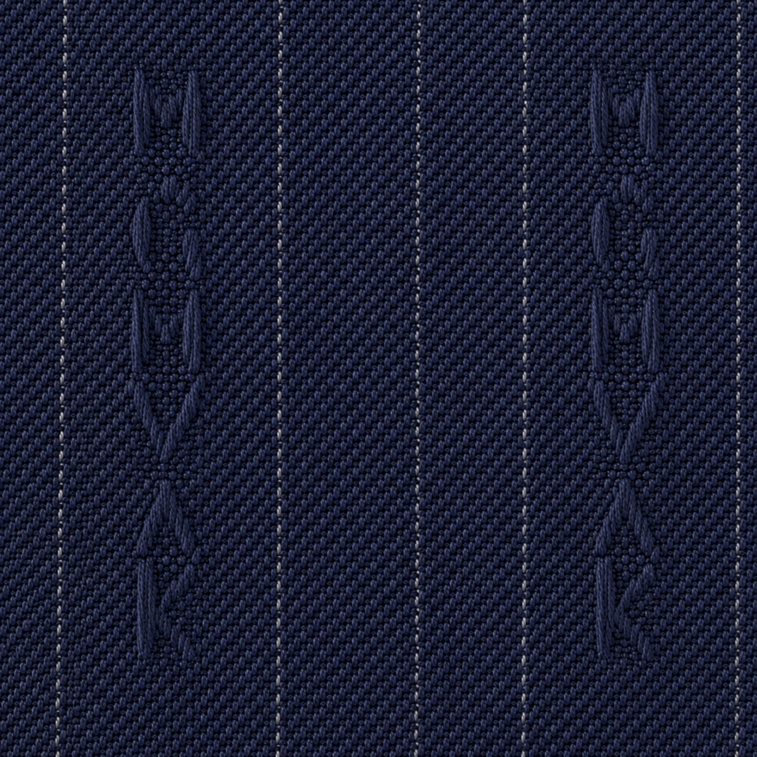 Close-up of Neilane navy fabric with a woven identity pattern